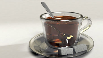 Cucchiaino in una tazzina di the